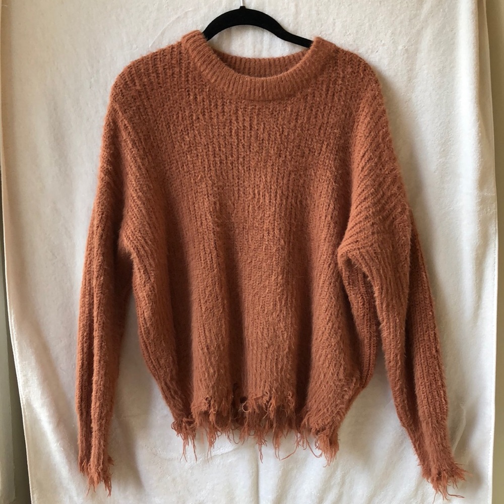 Distressed sweater